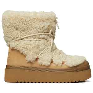 Tory Burch Mellow Shearling Platform Boots.