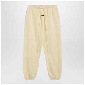 Fear of God Essentials Yellow jogging pants with logo