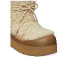 Tory Burch Mellow Shearling Platform Boots.