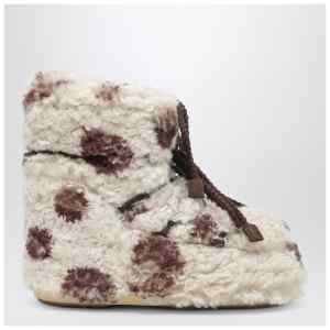 Moon Boot Icon Low curly boot with cow print