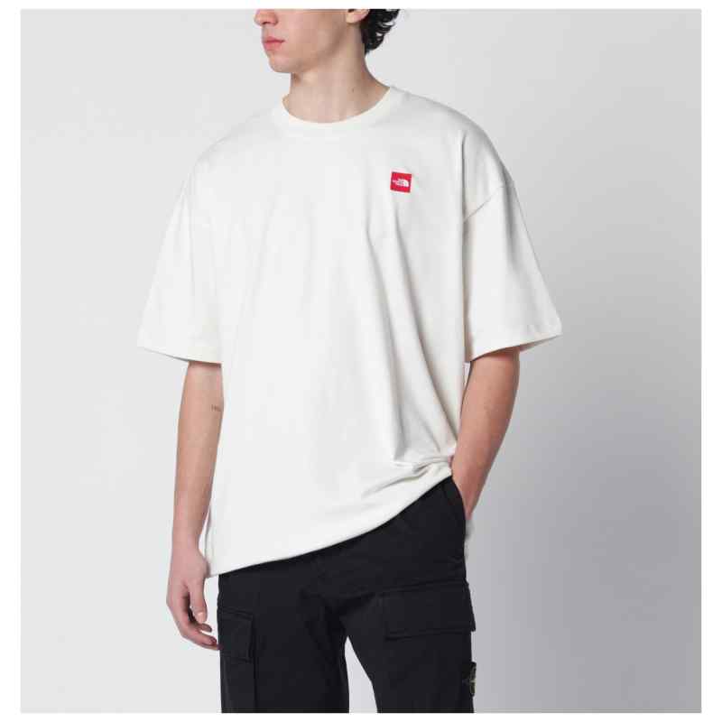 The North Face Ivory T-shirt with logo patch The North Face Ivory T-shirt with logo patch, theFeinheit