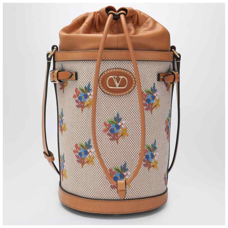 Valentino Garavani Canvas bucket bag with floral embroidery, theFeinheit