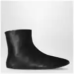 The Row Stella ankle boots black in leather and shearling