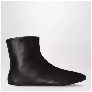 The Row Stella ankle boots black in leather and shearling