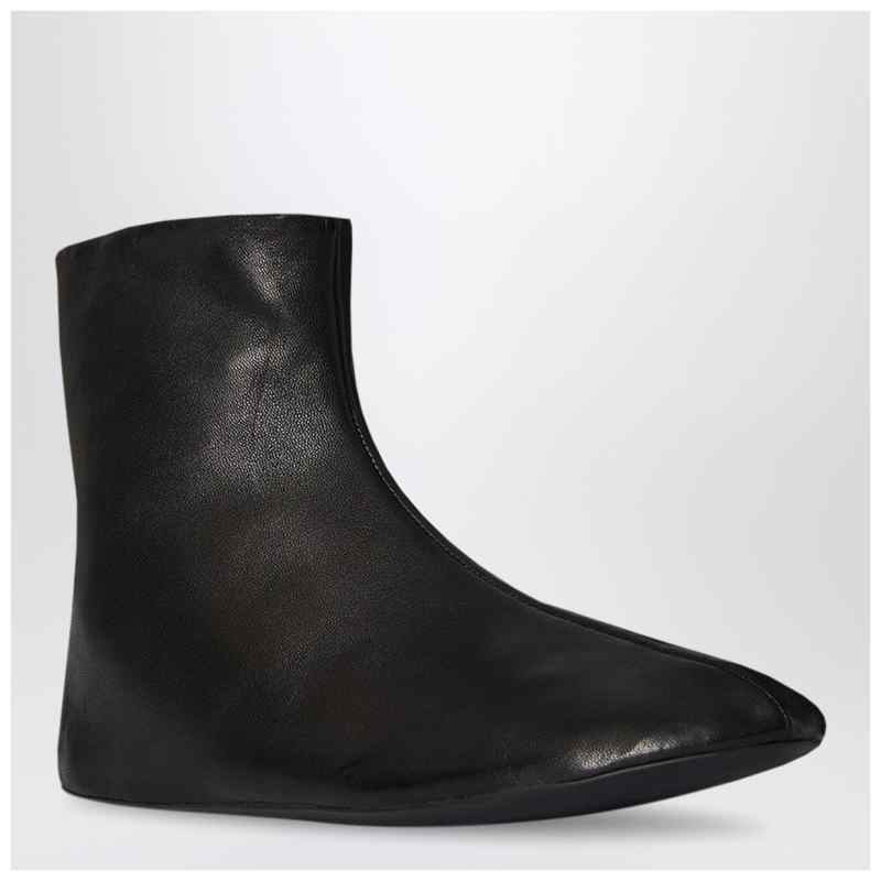 The Row Stella ankle boots black in leather and shearling, theFeinheit