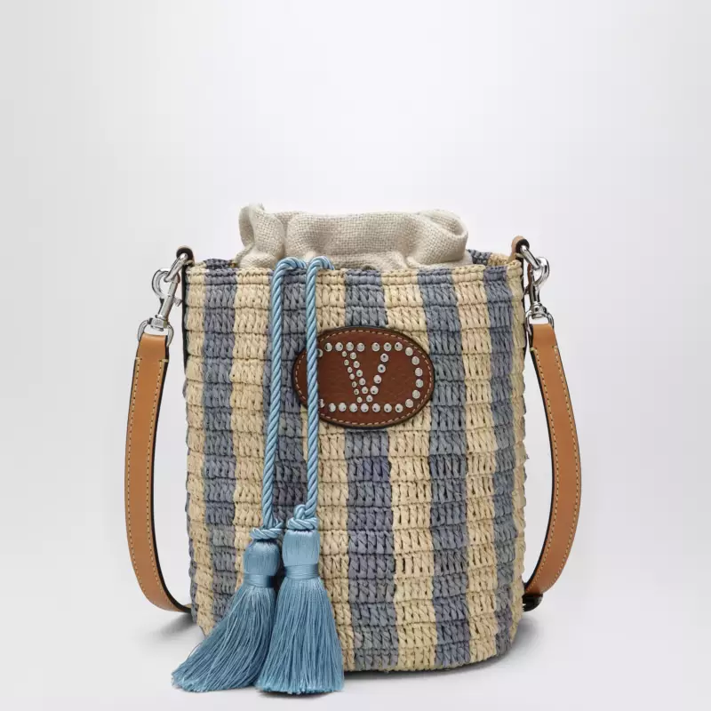 8W2B0T03IXU_S_VALE-C8G.a Valentino Garavani Small bucket bag in raffia with beige and light blue stripes