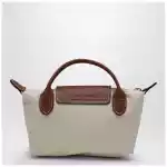 Longchamp Le Pliage Original papaer-coloured clutch bag