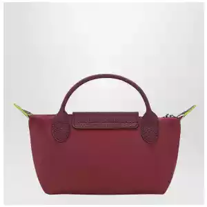 Longchamp Le Pliage Green Pomegranate coloured clutch bag