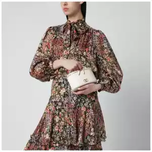 Valentino Garavani Vlogo Signature Mini Vanity Bag in ivory grained calfskin