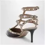 Valentino Garavani Rockstud strap pumps in patent leather, black/powder
