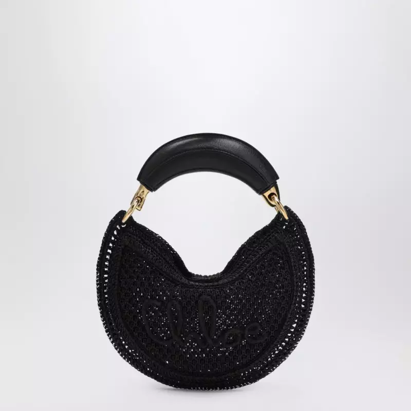 CH26SP921R34_S_CHLOE-001.a Chloé Mini Summer Banana hobo bag in black crochet with leather details