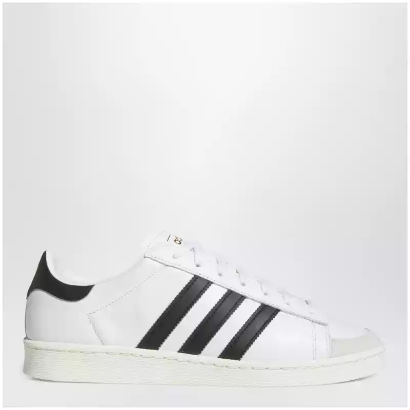 adidas Originals Jabbar Lo sneakers in white and black