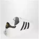 adidas Originals Jabbar Lo sneakers in white and black