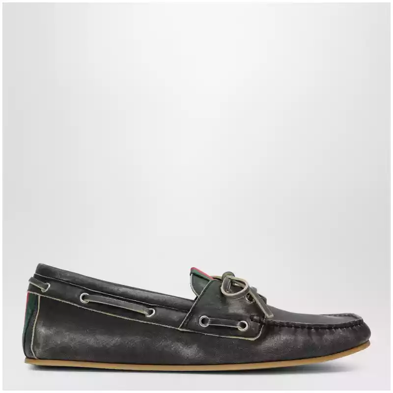 GUCCI Black boat shoes with washed effect