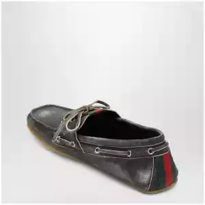 GUCCI Black boat shoes with washed effect