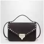 Valentino Garavani Small Rockstud crossbody bag in ebony brown suede