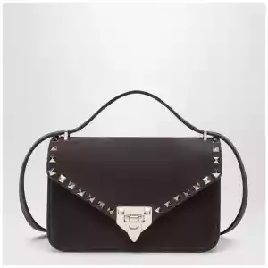 Valentino Garavani Small Rockstud crossbody bag in ebony brown suede