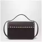 Valentino Garavani Small Rockstud crossbody bag in ebony brown suede
