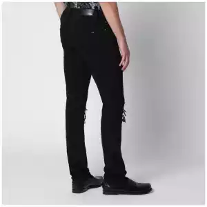 AMIRI Ripped skinny cotton jeans in black