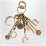 Chloé Bag charm keyring Symbols Logo in vintage gold brass