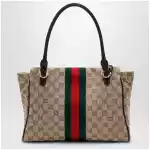 GUCCI Medium Paparazzo top-handle bag in GG canvas, brown