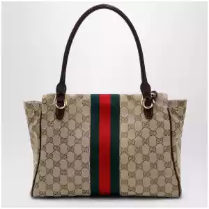 GUCCI Medium Paparazzo top-handle bag in GG canvas, brown
