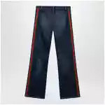 GUCCI Low-rise cotton denim Web tape trousers in blue