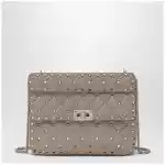Valentino Garavani Medium Rockstud Spike bag in powder pink nappa leather