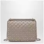 Valentino Garavani Medium Rockstud Spike bag in powder pink nappa leather